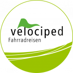 Rundes hellgrünes Logo von velociped Fahrradreisen